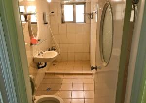 Kylpyhuone majoituspaikassa Fu Yuan B&B