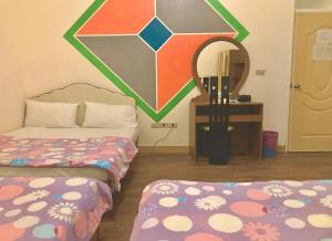 Vuode tai vuoteita majoituspaikassa Fu Yuan B&B