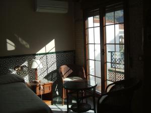 Posedenie v ubytovaní Vivienda Turistica Arabeluj