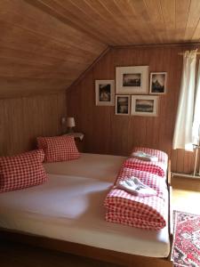 Postel nebo postele na pokoji v ubytování Gästehaus Schäfli