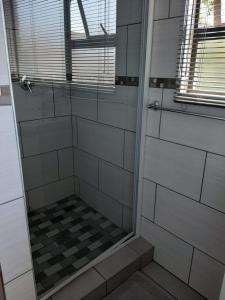Ένα μπάνιο στο Bergsight Self Catering Accommodation