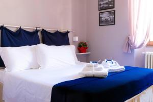 Postel nebo postele na pokoji v ubytování La Petite Maison