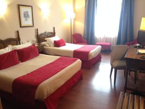 Postel nebo postele na pokoji v ubytování Hotel Pazo O Rial
