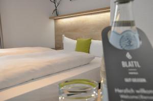 Postel nebo postele na pokoji v ubytování Hotel Perlach Allee by Blattl