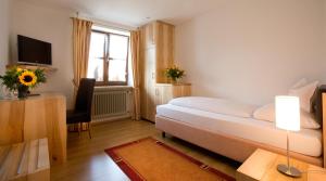 Postel nebo postele na pokoji v ubytování Boardinghouse Wadenspanner
