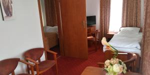 TV a/nebo společenská místnost v ubytování Hotel Korona
