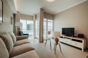 TV a/nebo společenská místnost v ubytování City Garden by Madeira Best Apartments