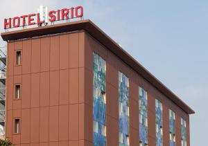 a hotel sign on the side of a building at LH Hotel Sirio Venice in Mestre