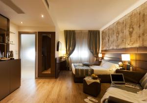 Posteľ alebo postele v izbe v ubytovaní LH Hotel Sirio Venice