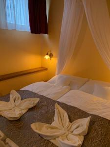 Postel nebo postele na pokoji v ubytování Hotel Therma Dunajská Streda