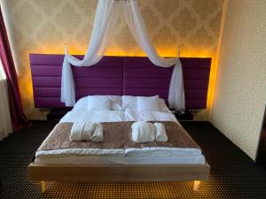 Postel nebo postele na pokoji v ubytování Hotel Therma Dunajská Streda