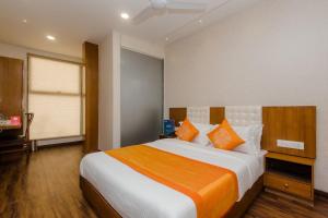 Postel nebo postele na pokoji v ubytování Hotel Airside
