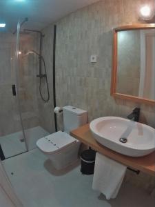 Koupelna v ubytování Sosiego Hostal de Mar