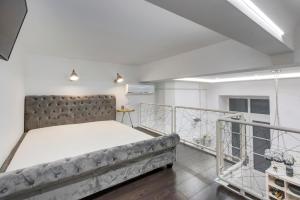 Postel nebo postele na pokoji v ubytování Semmelweis Apartment