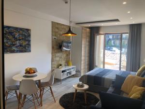 Posezení v ubytování Milmari Resort - Apartman L43