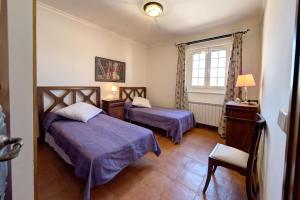 Ένα ή περισσότερα κρεβάτια σε δωμάτιο στο FINCA EL PIRUETANO