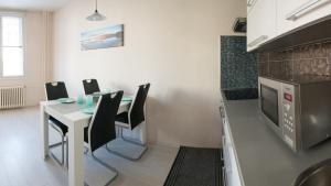 Kuchyň nebo kuchyňský kout v ubytování Apartment Třída Míru