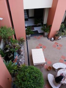 an overhead view of a patio with plants and a table at Chaisiri Park View in Ban Nong Lup