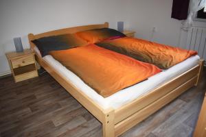 Postel nebo postele na pokoji v ubytování Apartmány Anna s bazénem a welness