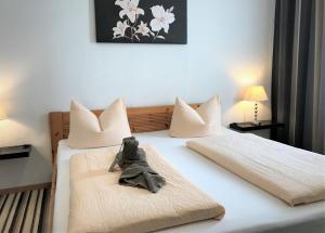 Postel nebo postele na pokoji v ubytování Hotel Antoni