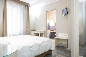 
Cama o camas de una habitación en Hotel Al Castello

