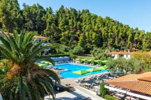 an aerial view of a resort with a swimming pool at Palladium Hotel in Kriopigi