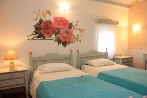 Voodi või voodid majutusasutuse Dorian Hotel toas