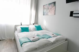 Ένα ή περισσότερα κρεβάτια σε δωμάτιο στο Studio Apartments nahe Messe