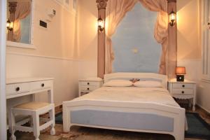 Voodi või voodid majutusasutuse Dorian Hotel toas