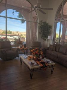 a living room with a couch and a coffee table at Days Inn by Wyndham Bullhead City in Bullhead City