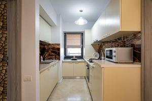 Фотография из галереи Blue Boutique Magic View of the Sea Apartments в Мамае
