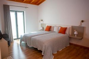 Кровать или кровати в номере Regada House