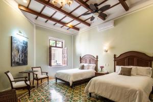 Tempat tidur dalam kamar di Casa Tavera- Adults Only +83 foto