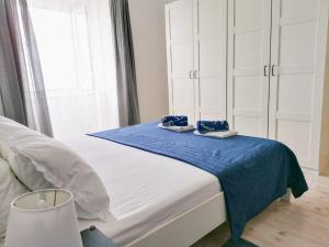 Postel nebo postele na pokoji v ubytování Apartments Valiža