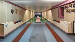 a bowling alley with bowling balls on the lanes at Gasthof zur Post in Raisting