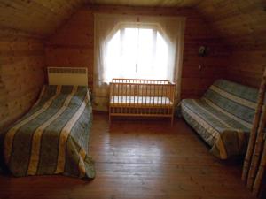 A bed or beds in a room at Holiday Home Dālderi