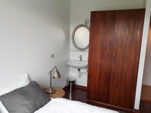 Cama o camas de una habitación en Guesthouse Geldingaholt