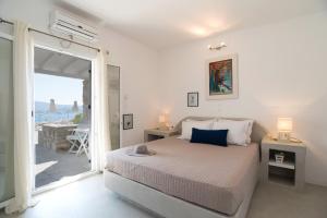 Ένα ή περισσότερα κρεβάτια σε δωμάτιο στο KrotiriBay adults +235 φωτογραφίες