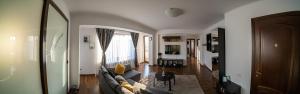 Χώρος καθιστικού στο Apartament Tatu bar&grill