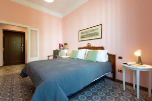 Ein Bett oder Betten in einem Zimmer der Unterkunft Elegante Casa Liberty