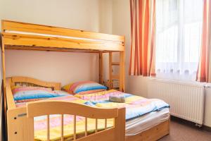 Postel nebo postele na pokoji v ubytování TATRYSTAY Julia Apartments + 21 fotografií