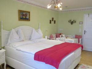 Postelja oz. postelje v sobi nastanitve Hotel Schneider-Gössl
