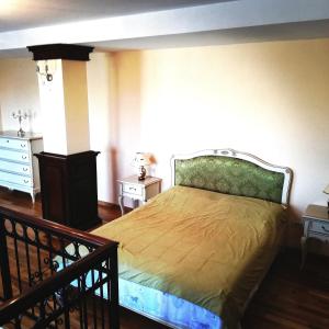 Ένα ή περισσότερα κρεβάτια σε δωμάτιο στο Penthouse Renașterii Amazonia