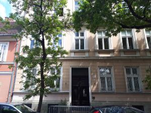 a building with a door in front of it at Gizella apartman in Budapest