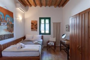 Ένα ή περισσότερα κρεβάτια σε δωμάτιο στο BATU vacation house