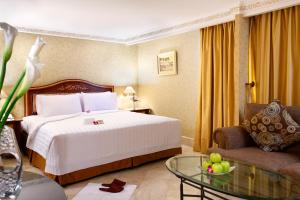 Postel nebo postele na pokoji v ubytování Ambhara Hotel