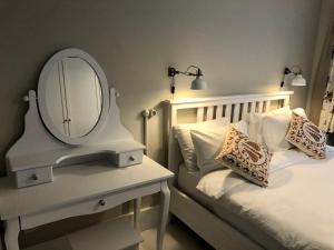 A bed or beds in a room at Mehmet Bey Suites