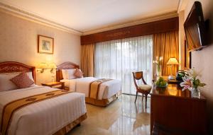 Postel nebo postele na pokoji v ubytování Ambhara Hotel + 22 fotografií