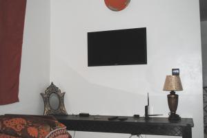 En TV eller et underholdningssystem på Appartement Anatim