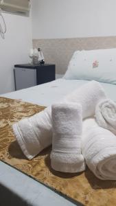 Cama ou camas em um quarto em Pousada Siroba BEIRA RIO
